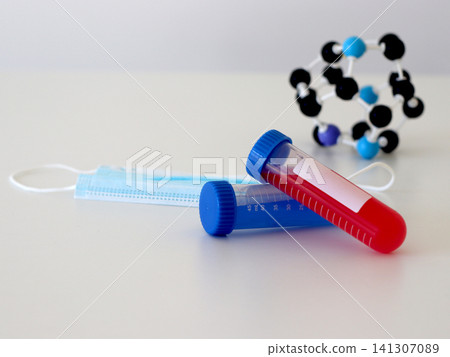 Laboratory sample tubes with molecular structure and protective mask for virus diagnostics, chemical testing and healthcare research concepts. Laboratory sample tubes with molecular structure and protective mask for virus diagnostics, chemical testing and healthcare research concepts. 141307089