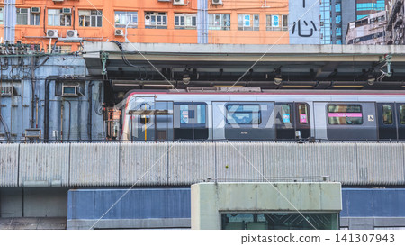 Hong Kong July 12 2026 MTR Train at Elevated Kwun Tong Station Hong Kong July 12 2026 MTR Train at Elevated Kwun Tong Station 141307943