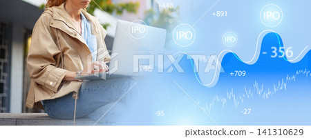 Investors analyze stock market data during an initial public offering process on a sunny day in an urban area 141310629