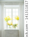 Flowers placed on the window side Flowers placed on the window side 141311817
