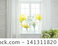 Flowers placed on the window side Flowers placed on the window side 141311820
