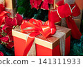 Christmas presents wrapped and tied with ribbons. 141311933
