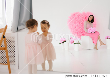 Reflection of Child in Mirror with Mother Background Reflection of Child in Mirror with Mother Background 141311975