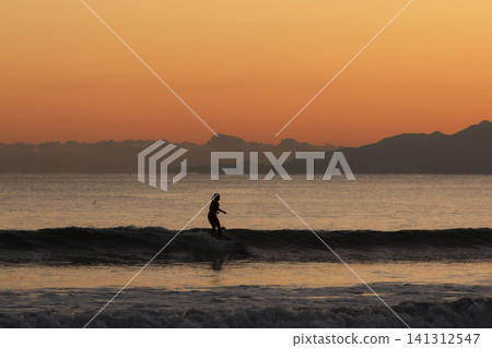 Shonan Kugenuma Beach: The sky after sunset and surfing Shonan Kugenuma Beach: The sky after sunset and surfing 141312547