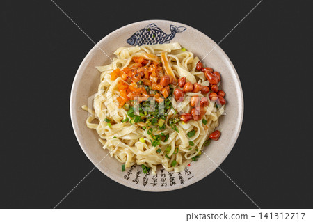handmade flat wheat noodles with sesame paste and peanut toppings, authentic Chinese regional dish. handmade flat wheat noodles with sesame paste and peanut toppings, authentic Chinese regional dish. 141312717
