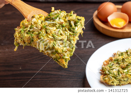 homemade acacia flower egg pancake with fresh ingredients preparation view. homemade acacia flower egg pancake with fresh ingredients preparation view. 141312725
