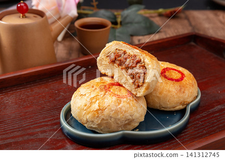 baked flaky Chinese flatbread stuffed with savory minced beef, traditional meat pastry. baked flaky Chinese flatbread stuffed with savory minced beef, traditional meat pastry. 141312745