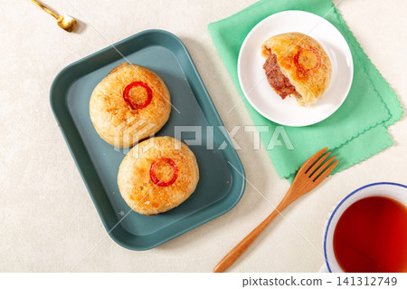 authentic Tianjin Shaobing, crispy baked sesame biscuits filled with seasoned beef. authentic Tianjin Shaobing, crispy baked sesame biscuits filled with seasoned beef. 141312749