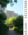 A streetscape with apartment buildings around Yokohama Ryokuen-toshi Station. 141313688