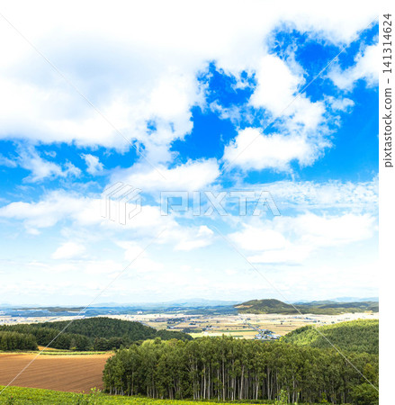 A view of Fukagawa city, Hokkaido, from Togairo Pass on an autumn day. A view of Fukagawa city, Hokkaido, from Togairo Pass on an autumn day. 141314624