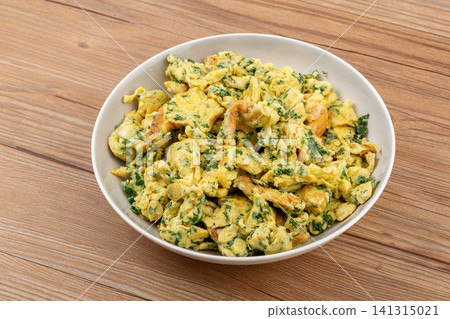 stir-fried scrambled eggs with chopped kale, healthy Chinese home-style dish stir-fried scrambled eggs with chopped kale, healthy Chinese home-style dish 141315021