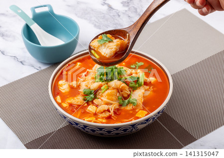 braised basa fish fillet in rich tomato soup with cilantro braised basa fish fillet in rich tomato soup with cilantro 141315047