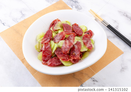 stir-fried sliced Chinese sausage with crisp celtuce, traditional style stir-fried sliced Chinese sausage with crisp celtuce, traditional style 141315102