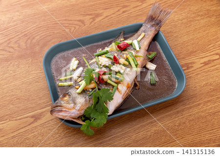 cantonese style steamed sea bass with scallions, ginger and soy sauce cantonese style steamed sea bass with scallions, ginger and soy sauce 141315136