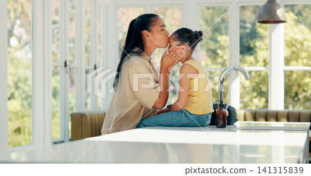 Kiss, mother and daughter with getting ready in home on kitchen table with backpack and greeting. Morning, girl child and mom with prepare for education, learning and kindergarten with love and care Kiss, mother and daughter with getting ready in home on kitchen table with backpack and greeting. Morning, girl child and mom with prepare for education, learning and kindergarten with love and care 141315839