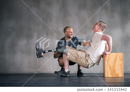 Physiotherapist, person with a disability and prosthetic leg and trainer in physiotherapy, studio and gym block. Male people, training and amputee for wellness, fitness and exercise in sports center 141315942