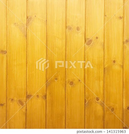 Square background image of a vertically paneled wall made of varnished wood with yellowish-brown grain and knots. Square background image of a vertically paneled wall made of varnished wood with yellowish-brown grain and knots. 141315963