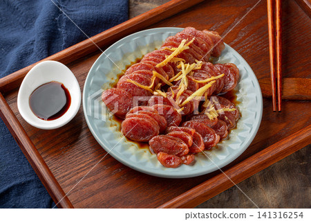 cantonese Steamed Chinese Sausage with Ginger Slices a Traditional Dim Sum Item cantonese Steamed Chinese Sausage with Ginger Slices a Traditional Dim Sum Item 141316254