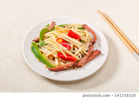 stir Fried Winter Bamboo Shoots with Traditional Hunan Blood Pork Sausage stir Fried Winter Bamboo Shoots with Traditional Hunan Blood Pork Sausage 141316320