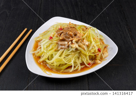 chilled Shredded Celtuce Salad Topped with Rich and Savory Sesame Sauce chilled Shredded Celtuce Salad Topped with Rich and Savory Sesame Sauce 141316417