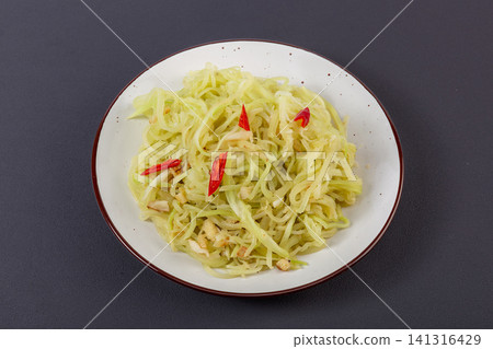 chilled Shredded Celtuce Salad Dressed with Rich Sesame Peanut Sauce and Chilies chilled Shredded Celtuce Salad Dressed with Rich Sesame Peanut Sauce and Chilies 141316429