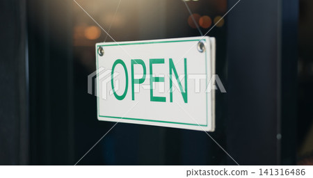 Coffee shop, open sign and front door for notice on board, information and guide for news at store. Poster, window and welcome message for small business, cafeteria or diner in closeup at restaurant Coffee shop, open sign and front door for notice on board, information and guide for news at store. Poster, window and welcome message for small business, cafeteria or diner in closeup at restaurant 141316486