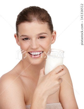 Woman, glass of milk and smile in studio portrait for healthcare, skincare or beauty and cosmetics. Female person, happy or satisfied with cup of dairy for immune system, dermatology and wellness Woman, glass of milk and smile in studio portrait for healthcare, skincare or beauty and cosmetics. Female person, happy or satisfied with cup of dairy for immune system, dermatology and wellness 141316512
