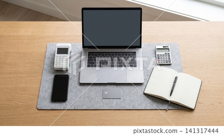 Clean minimalist office workspace with laptop and financial planning tools workspace business financial planning calculator notebook minimalist professional computer technology employment Clean minimalist office workspace with laptop and financial planning tools workspace business financial planning calculator notebook minimalist professional computer technology employment 141317444