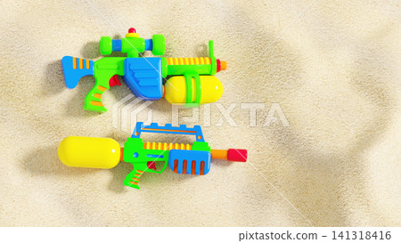 Two bright toy water blasters on beach sand with copy space. Summer fun and family holiday concept Two bright toy water blasters on beach sand with copy space. Summer fun and family holiday concept 141318416