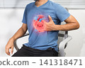 Heart Palpitations Concept with Cartoon Heart on Man Holding Chest 141318471
