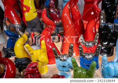 Naples, italy. December 29, 2024. Traditional ceramic curnicello charms and corno amulets offering protection and good fortune in naples, italy Naples, italy. December 29, 2024. Traditional ceramic curnicello charms and corno amulets offering protection and good fortune in naples, italy 141318644