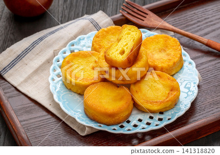 pan fried coarse grain corn cakes with golden crispy crust pan fried coarse grain corn cakes with golden crispy crust 141318820