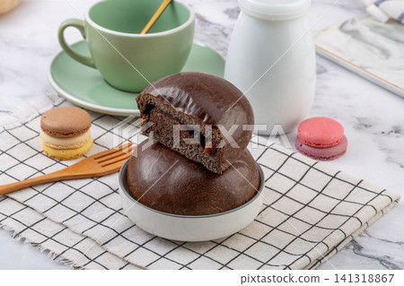 dark chocolate cocoa bread bun filled with chocolate chips soft pastry 141318867