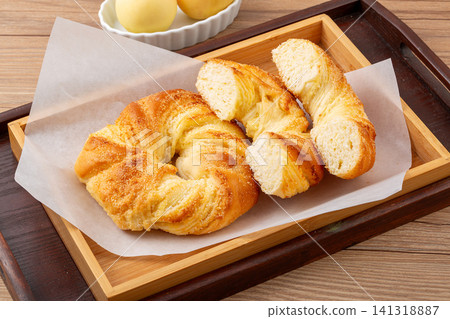 twisted coconut ring bread soft sweet pastry with shredded coconut flakes twisted coconut ring bread soft sweet pastry with shredded coconut flakes 141318887