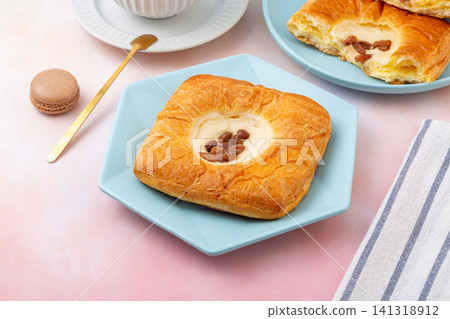 sweet raisin cream danish pastry flaky puff bread with custard filling sweet raisin cream danish pastry flaky puff bread with custard filling 141318912