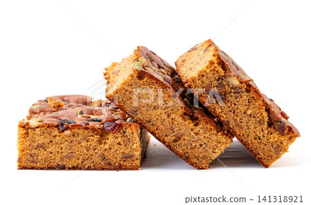 traditional Chinese jujube cake slices topped with mixed nuts and seeds traditional Chinese jujube cake slices topped with mixed nuts and seeds 141318921