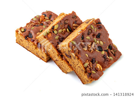 traditional Chinese jujube cake slices topped with mixed nuts and seeds traditional Chinese jujube cake slices topped with mixed nuts and seeds 141318924