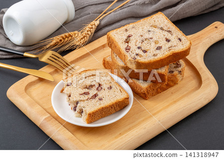 slices of whole wheat Lieba bread with red bean and walnut filling slices of whole wheat Lieba bread with red bean and walnut filling 141318947