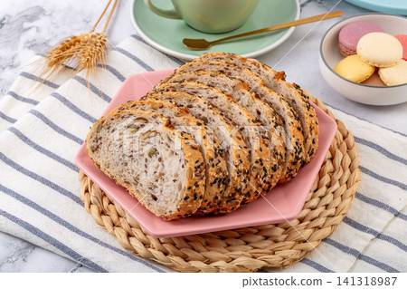 slices of artisanal European sourdough bread with flaxseed and walnut slices of artisanal European sourdough bread with flaxseed and walnut 141318987