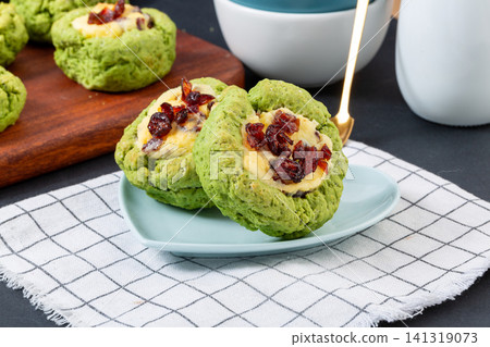 green tea matcha scone with cranberry and cream cheese filling 141319073