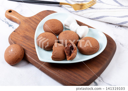 soft baked chocolate cookies with gooey lava chocolate filling soft baked chocolate cookies with gooey lava chocolate filling 141319103