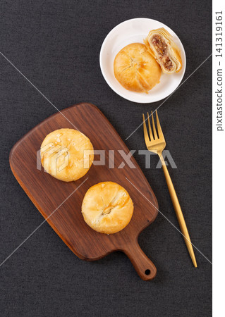 traditional Suzhou style flaky mooncake filled with aromatic rose paste traditional Suzhou style flaky mooncake filled with aromatic rose paste 141319161