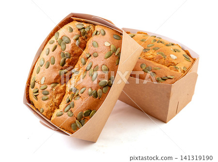slice of golden pillow cake with red date flavor and sliced almond topping slice of golden pillow cake with red date flavor and sliced almond topping 141319190