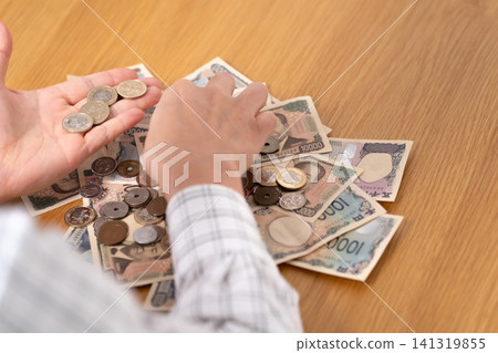 Hands counting money Hands counting money 141319855