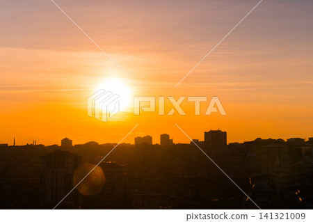 Dramatic sunset sky with the setting sun over the city, Istanbul Dramatic sunset sky with the setting sun over the city, Istanbul 141321009