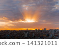 Dramatic sunset sky with the setting sun and clouds over the city, Istanbul 141321011