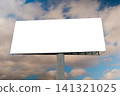 Mock up: blank white billboard and white clouds in the blue sky 141321025