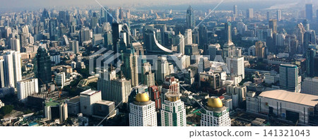 Aerial View of Bangkok Skyline with Modern Skyscrapers and Urban Cityscape, Thailand Aerial View of Bangkok Skyline with Modern Skyscrapers and Urban Cityscape, Thailand 141321043