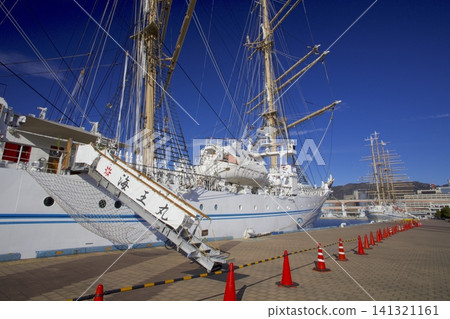 The sailing ships "Nippon Maru" and "Kaiwo Maru" are docked in Kobe Port. The sailing ships "Nippon Maru" and "Kaiwo Maru" are docked in Kobe Port. 141321161