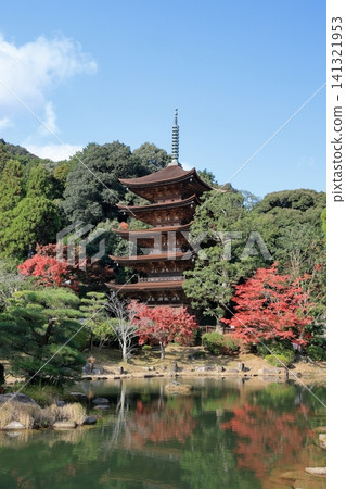 A five-story pagoda shining brightly in the autumn sunshine. A five-story pagoda shining brightly in the autumn sunshine. 141321953